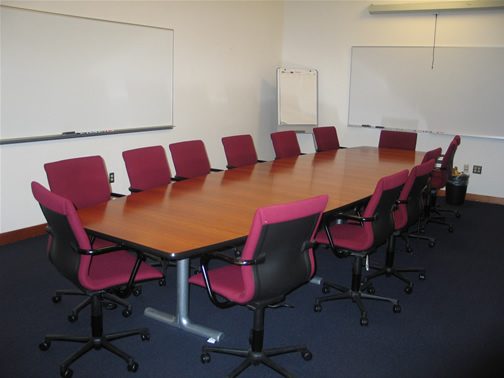 Conference Room 106 Seats 15, White Board, Pull-Down Screen